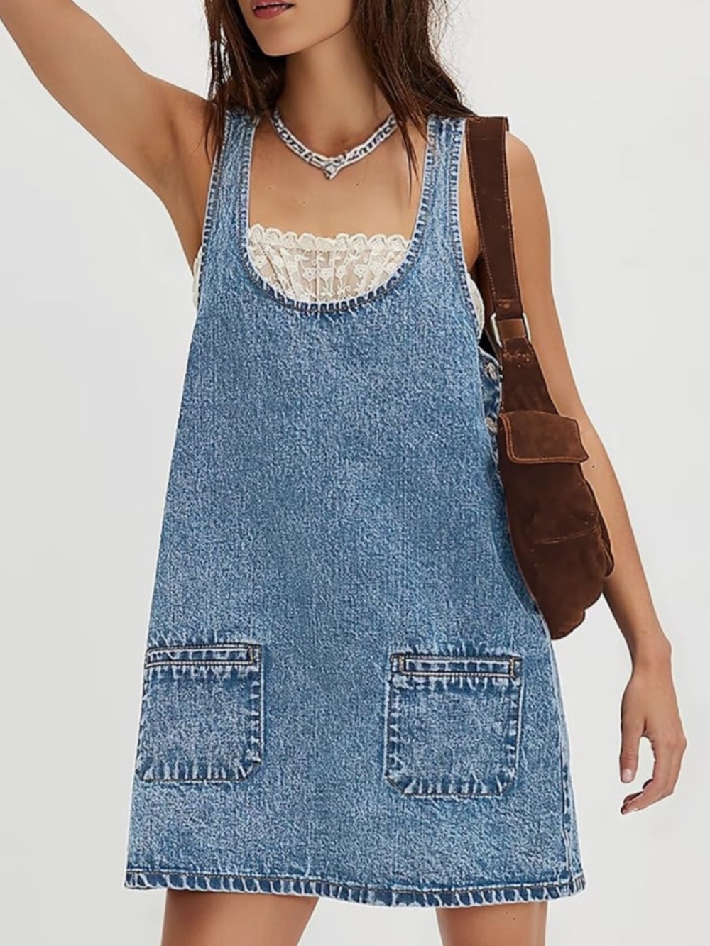 Casual sleeveless denim dress pinafore. Scoop neckline with a lace inset. Front - Picture 1 of 2